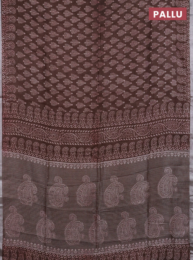 Pure linen saree brown with allover butta prints and silver zari woven border