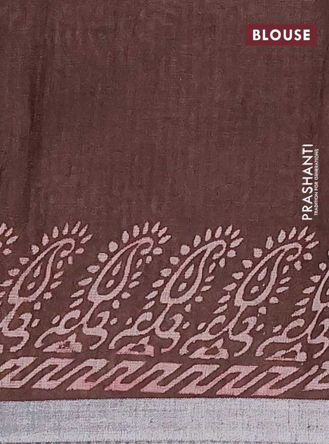 Pure linen saree brown with allover butta prints and silver zari woven border