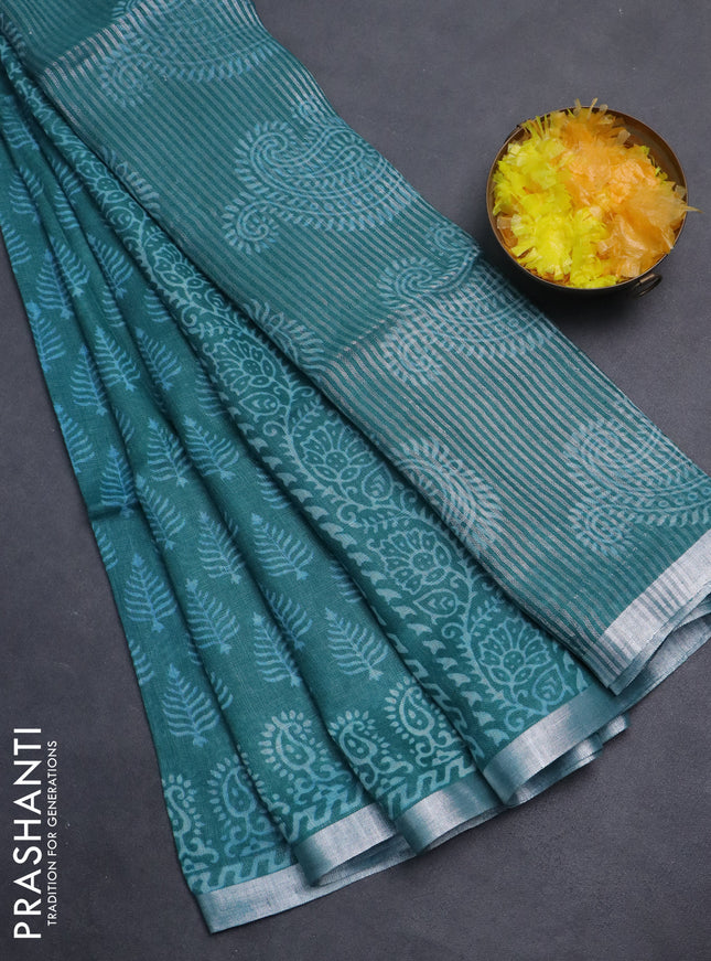 Pure linen saree teal green with allover butta prints and silver zari woven border