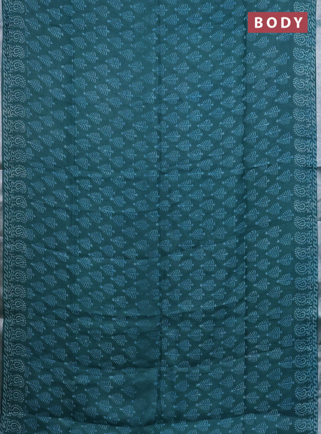 Pure linen saree teal green with allover butta prints and silver zari woven border