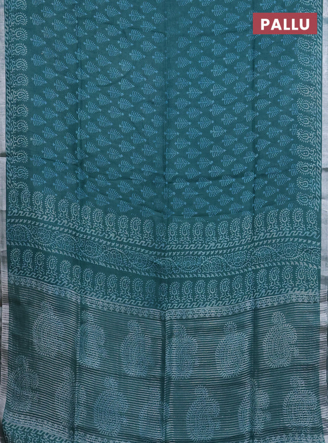Pure linen saree teal green with allover butta prints and silver zari woven border