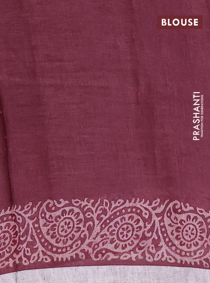 Pure linen saree wine shade with allover butta prints and silver zari woven border