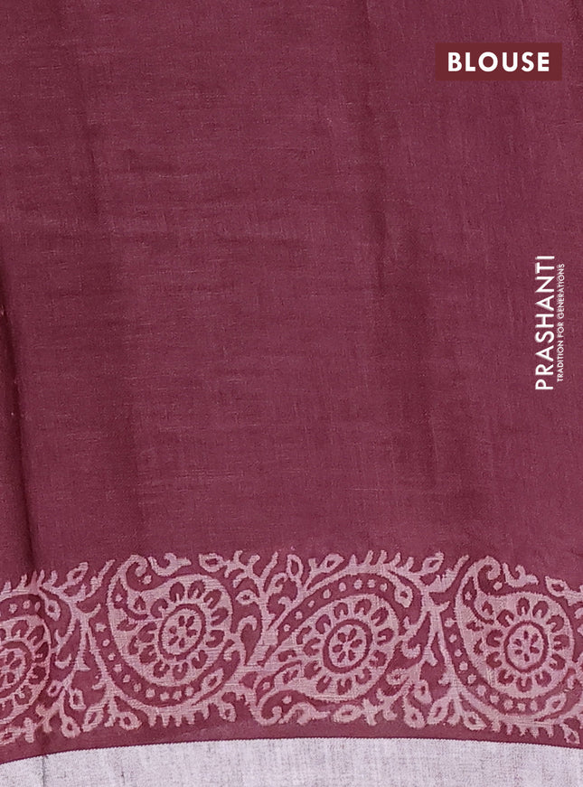 Pure linen saree wine shade with allover butta prints and silver zari woven border