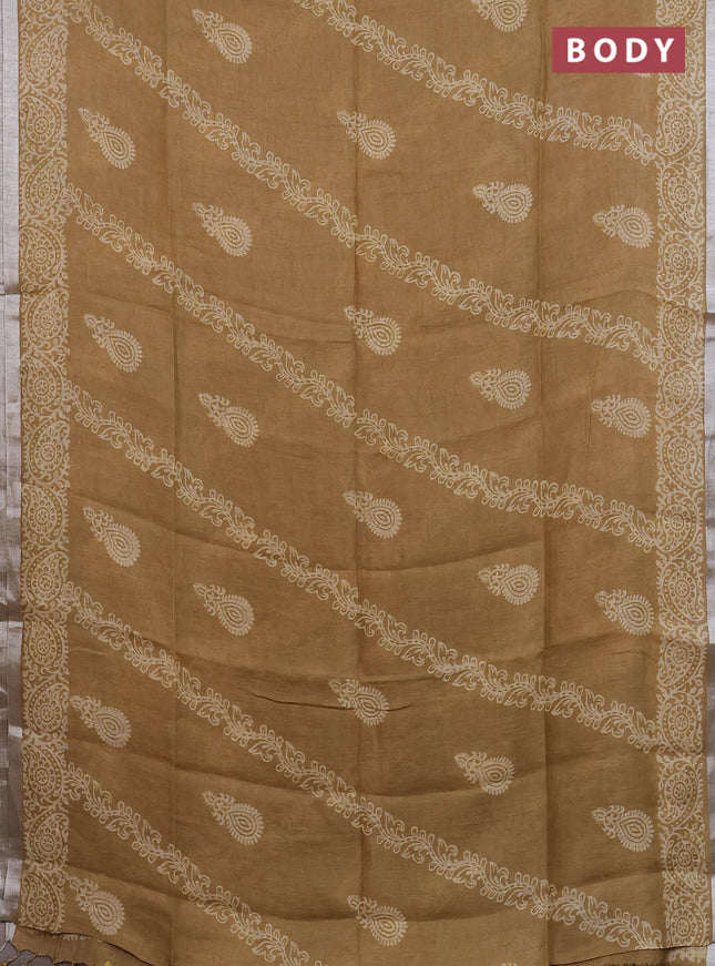 Pure linen saree sandal with allover butta prints and silver zari woven border