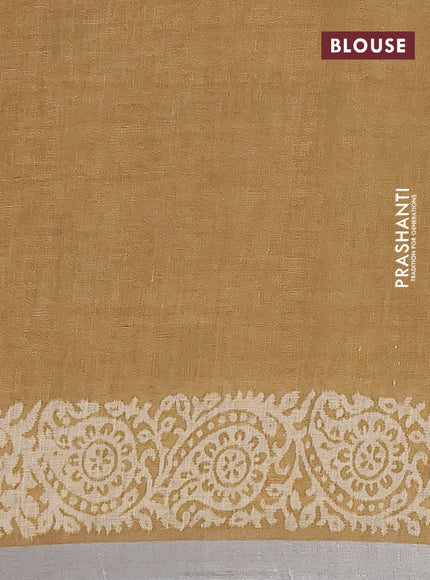 Pure linen saree sandal with allover butta prints and silver zari woven border