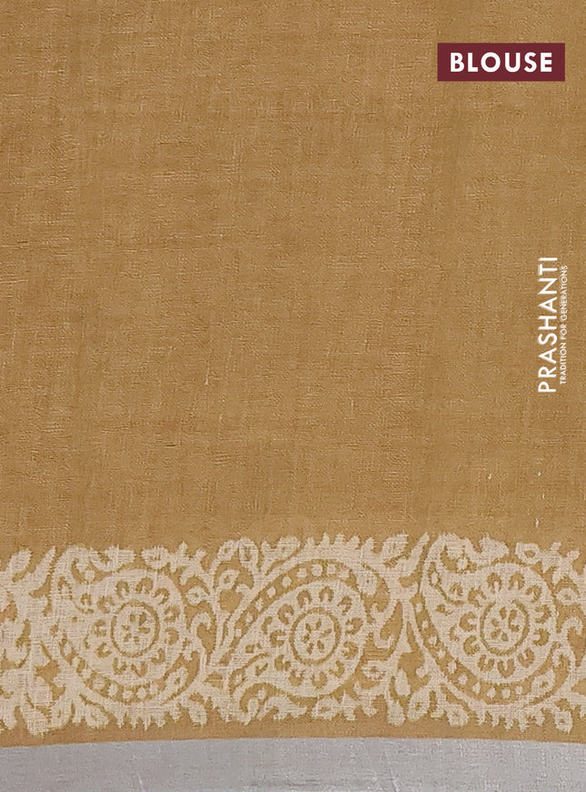 Pure linen saree sandal with allover butta prints and silver zari woven border