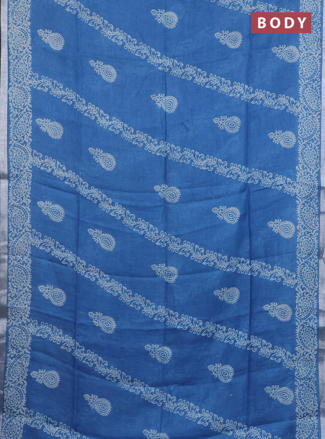 Pure linen saree cs blue with allover butta prints and silver zari woven border