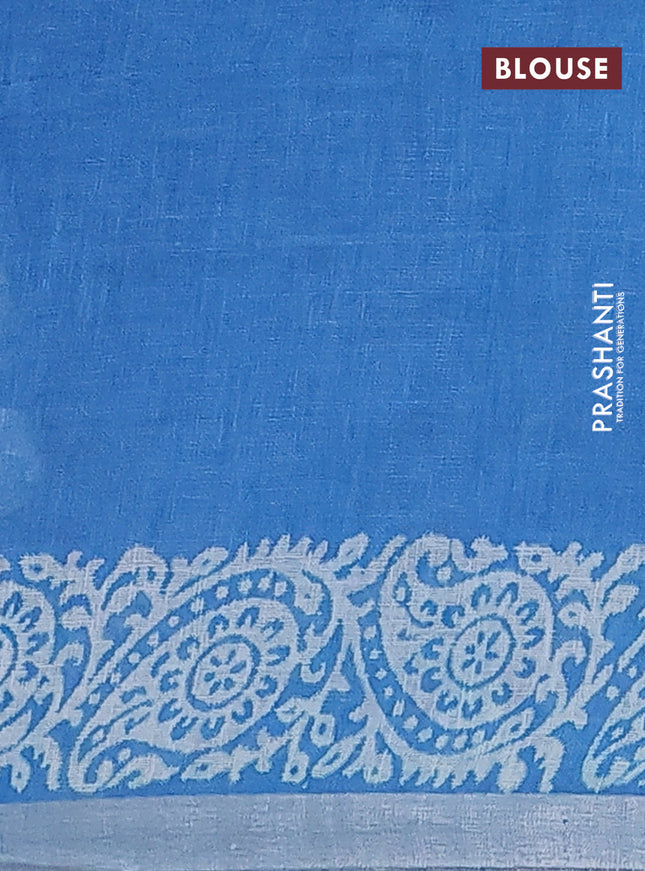 Pure linen saree cs blue with allover butta prints and silver zari woven border