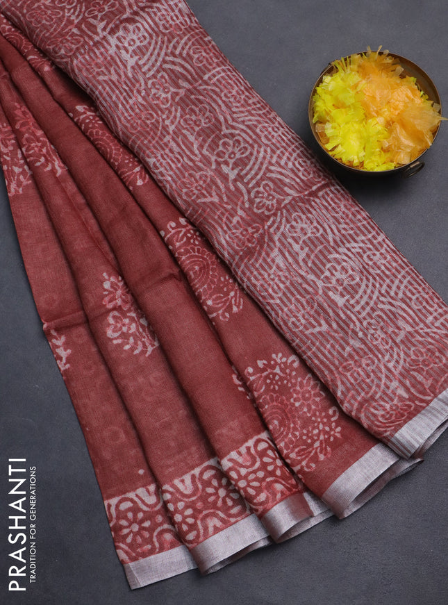 Pure linen saree maroon with allover butta prints and silver zari woven border