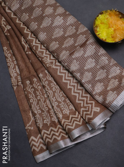 Pure linen saree brown with allover butta prints and silver zari woven border