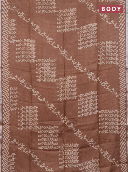 Pure linen saree brown with allover butta prints and silver zari woven border