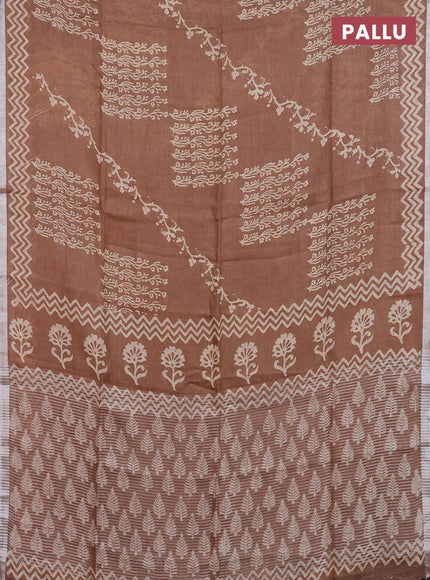 Pure linen saree brown with allover butta prints and silver zari woven border