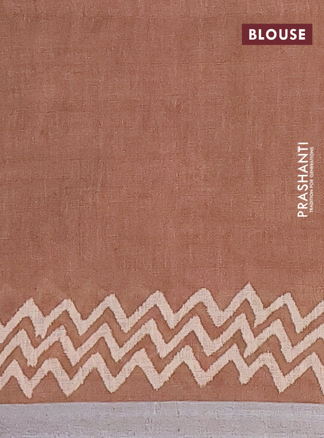 Pure linen saree brown with allover butta prints and silver zari woven border
