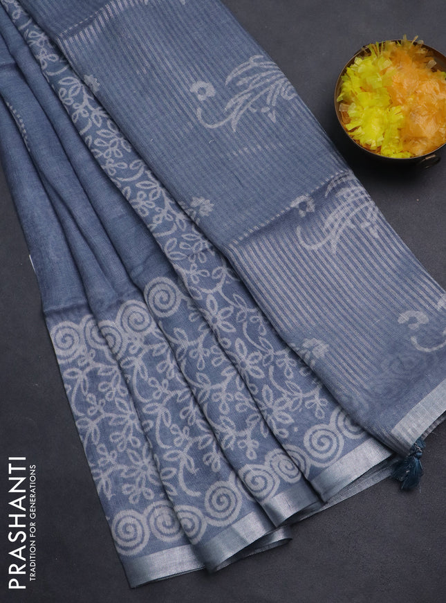 Pure linen saree pastel blue with allover butta prints and silver zari woven border
