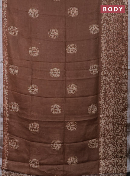 Pure linen saree brown shade with allover butta prints and silver zari woven border