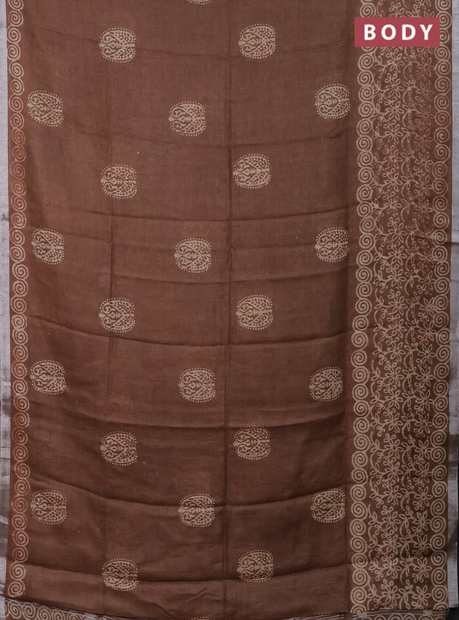 Pure linen saree brown shade with allover butta prints and silver zari woven border
