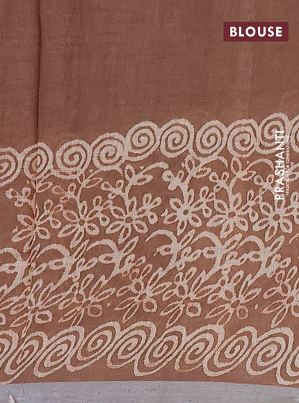 Pure linen saree brown shade with allover butta prints and silver zari woven border