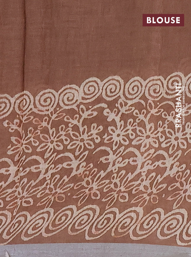 Pure linen saree brown shade with allover butta prints and silver zari woven border