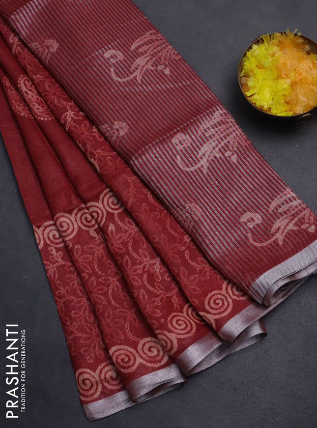 Pure linen saree maroon with allover butta prints and silver zari woven border
