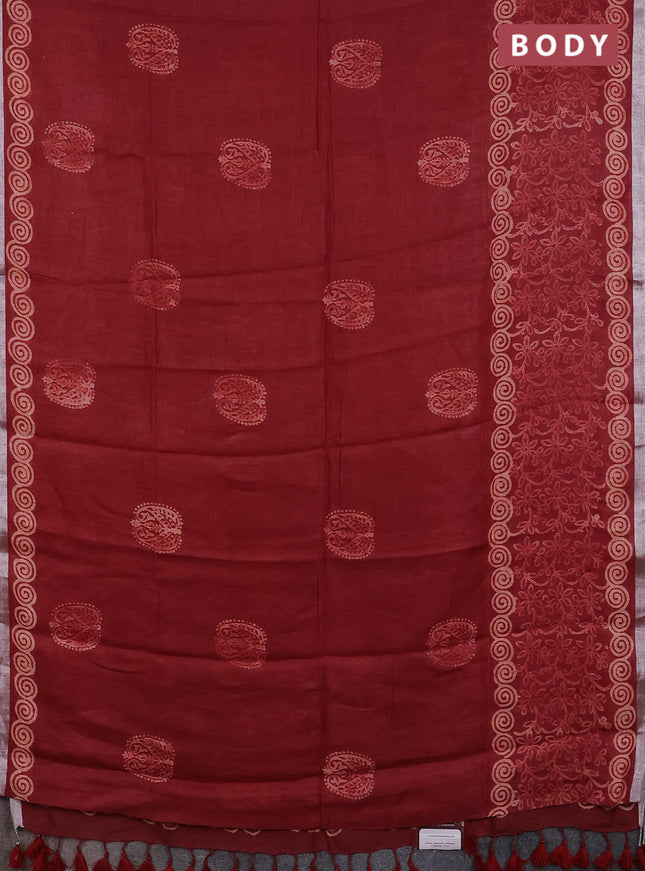 Pure linen saree maroon with allover butta prints and silver zari woven border
