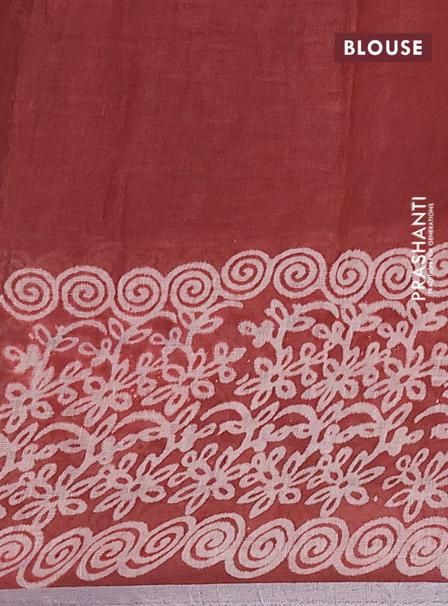 Pure linen saree rust shade with allover butta prints and silver zari woven border