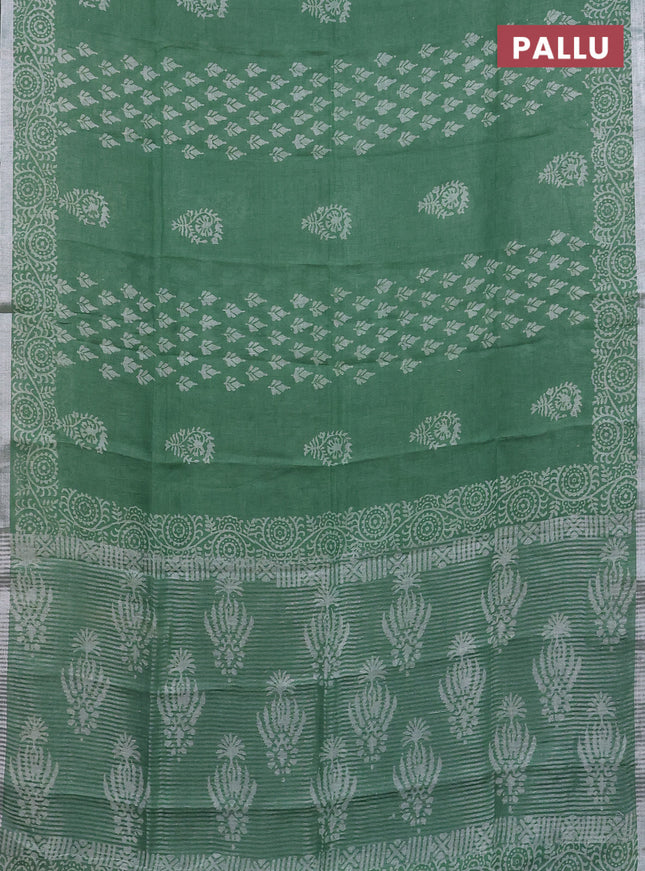 Pure linen saree green with allover butta prints and silver zari woven border