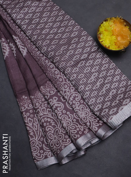 Pure linen saree mild wine shade with butta prints and silver zari woven border