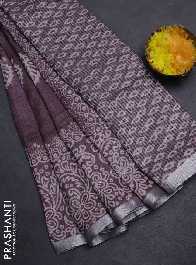 Pure linen saree mild wine shade with butta prints and silver zari woven border
