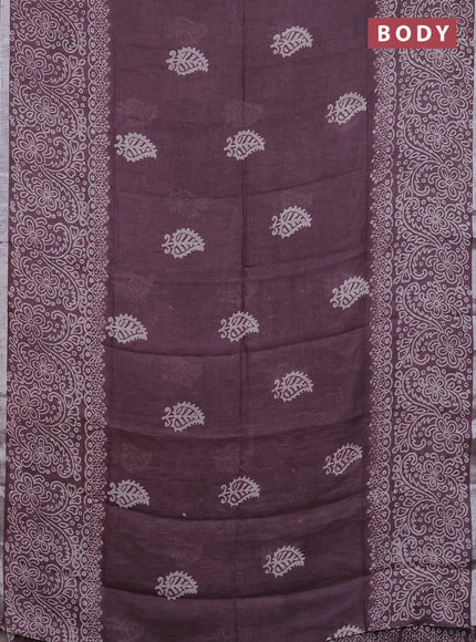 Pure linen saree mild wine shade with butta prints and silver zari woven border