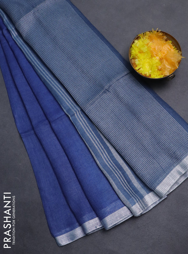 Pure linen saree blue and bluish grey with plain body and silver zari woven border