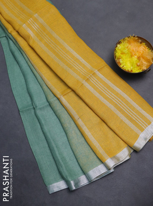 Pure linen saree pastel green and yellow with plain body and silver zari woven border