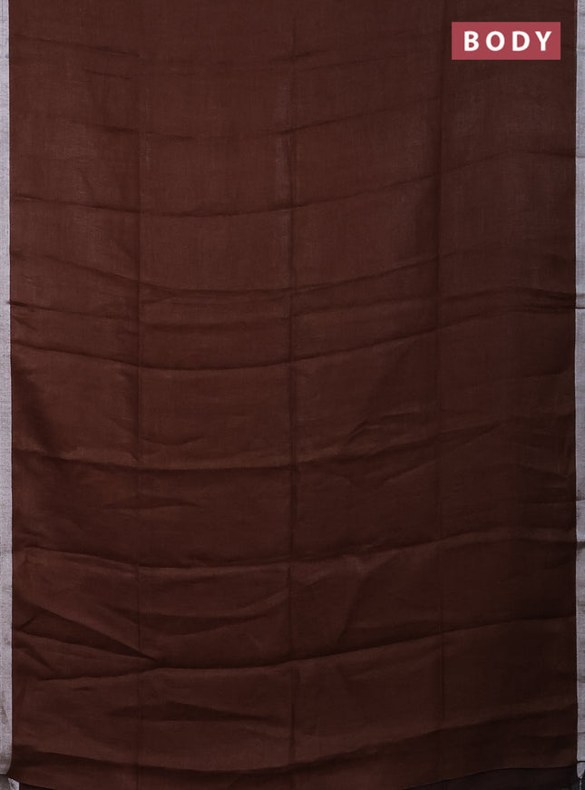 Pure linen saree brown with plain body and silver zari woven border