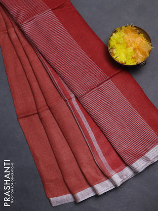 Pure linen saree rust shade and maroon with plain body and silver zari woven border