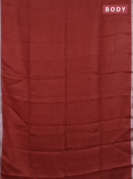 Pure linen saree rust shade and maroon with plain body and silver zari woven border