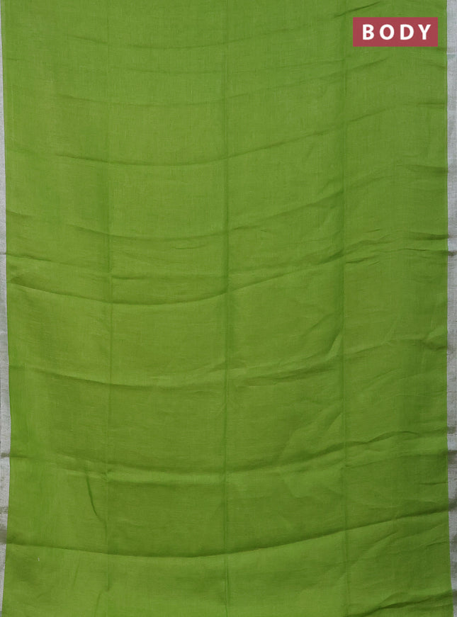 Pure linen saree light green and lime yellow with plain body and silver zari woven border