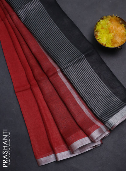 Pure linen saree red and black with plain body and silver zari woven border