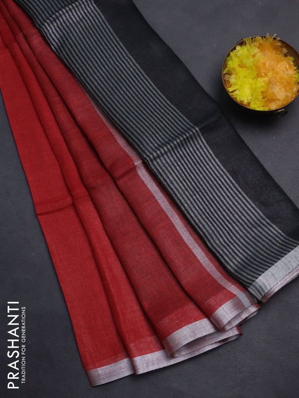 Pure linen saree red and black with plain body and silver zari woven border