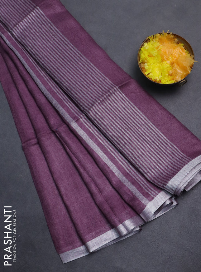 Pure linen saree mild purple with plain body and silver zari woven border