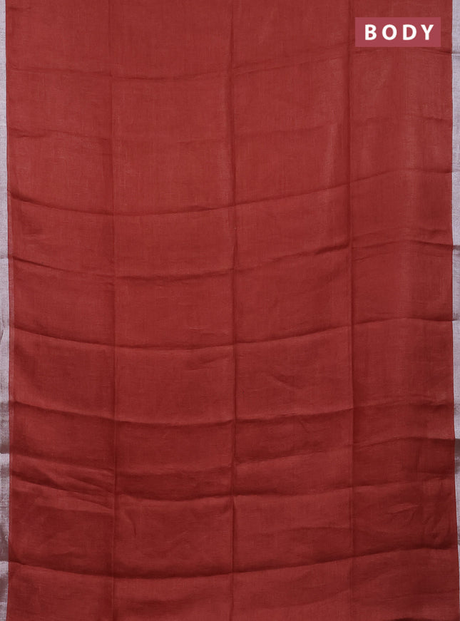 Pure linen saree rust shade and maroon with plain body and silver zari woven border