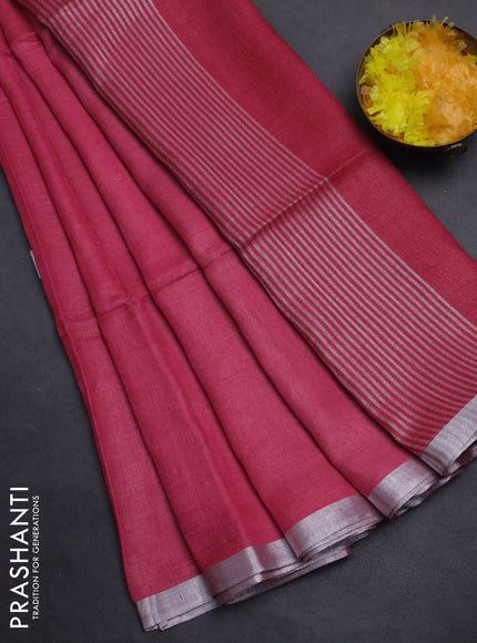 Pure linen saree pink shade with plain body and silver zari woven border