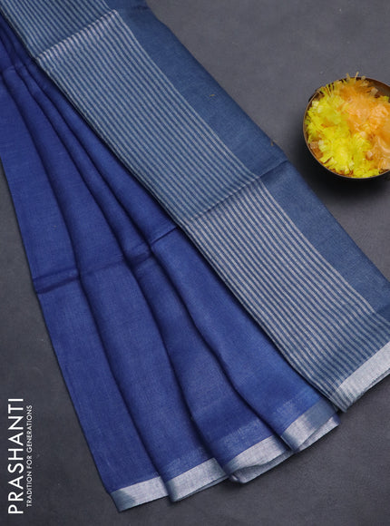 Pure linen saree blue and bluish grey with plain body and silver zari woven border