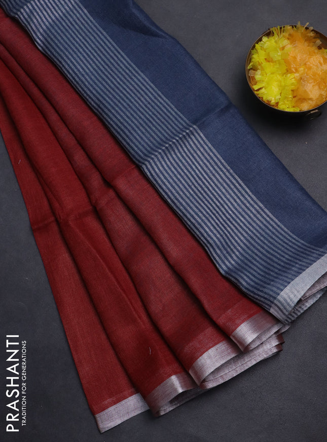 Pure linen saree maroon and bluish grey with plain body and silver zari woven border