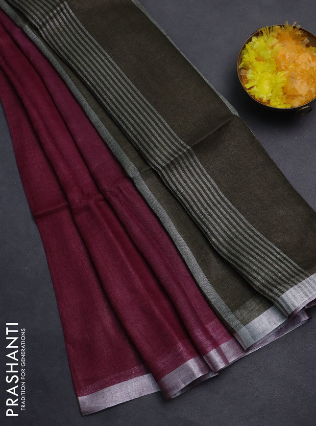 Pure linen saree dark magenta pink and dark sap green with plain body and silver zari woven border