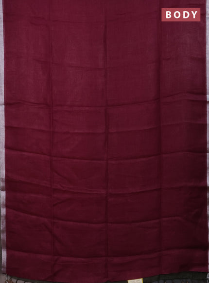 Pure linen saree dark magenta pink and dark sap green with plain body and silver zari woven border