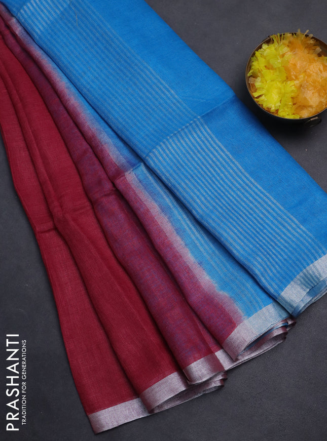 Pure linen saree dark pink and cs blue with plain body and silver zari woven border