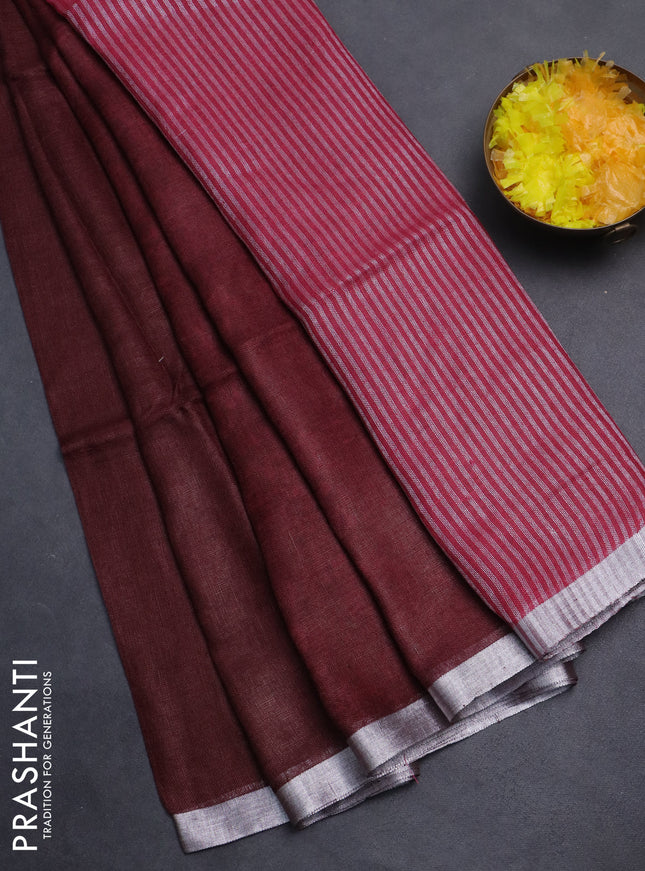 Pure linen saree maroon with plain body and silver zari woven border