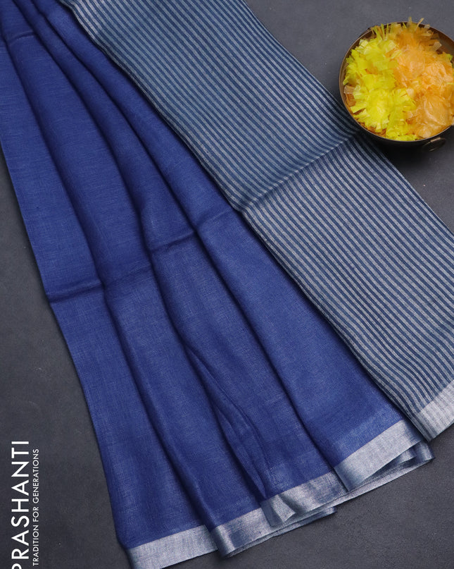 Pure linen saree blue shade and bluish grey with plain body and silver zari woven border