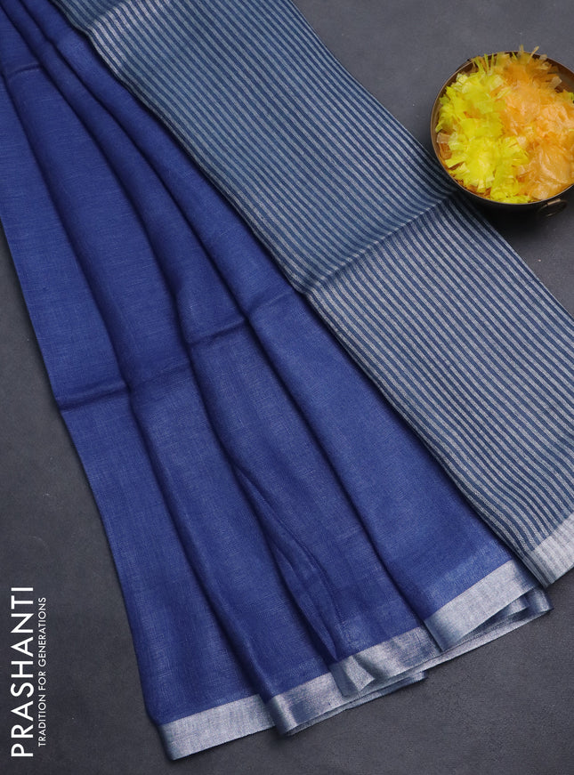 Pure linen saree blue shade and bluish grey with plain body and silver zari woven border