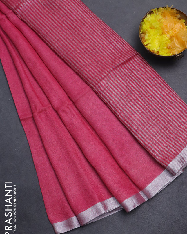 Pure linen saree pink with plain body and silver zari woven border
