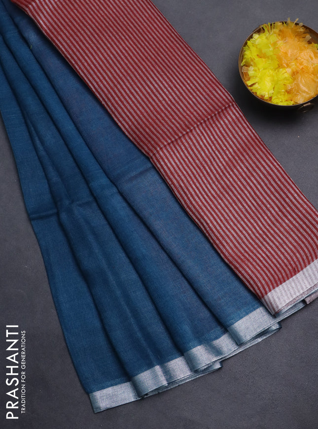 Pure linen saree peacock blue and maroon with plain body and silver zari woven border